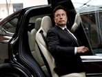 Tesla layoffs: Tesla Chief Executive Officer Elon Musk gets in a Tesla car as he leaves a hotel in Beijing, China.
