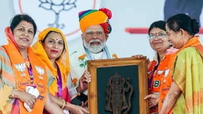 PM Narendra Modi being felicitated during a public meeting for the second phase of the Lok Sabha elections, in Tonk-Sawai Madhopur on Tuesday. (BJP ) PM Narendra Modi being felicitated during a public meeting for the second phase of the Lok Sabha elections, in Tonk-Sawai Madhopur on Tuesday. (BJP )