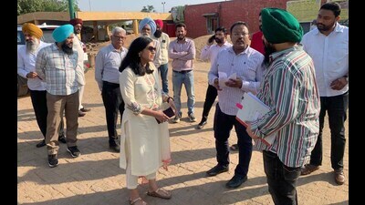 Deputy commissioner Sakshi Sawhney with other officials during a visit to grain markets of Lalton and Jodhan in Ludhiana on Tuesday. (HT Photo) Deputy commissioner Sakshi Sawhney with other officials during a visit to grain markets of Lalton and Jodhan in Ludhiana on Tuesday. (HT Photo)