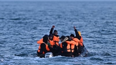 (FILES) Migrants travel in an inflatable boat across the English Channel, bound for Dover on the south coast of England. (AFP) (FILES) Migrants travel in an inflatable boat across the English Channel, bound for Dover on the south coast of England. (AFP)