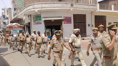 Ghaziabad police take out a flag march in Dasna area of Ghaziabad on Tuesday. (Sakib Ali/HT Photo) Ghaziabad police take out a flag march in Dasna area of Ghaziabad on Tuesday. (Sakib Ali/HT Photo)
