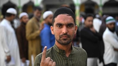 A Muslim man shows his inked finger after casting his ballot to vote in the first phase of India's general election at a polling station in Kairana, Shamli district, in India's Uttar Pradesh state on April 19, 2024. (Photo by Sajjad HUSSAIN / AFP) (AFP) A Muslim man shows his inked finger after casting his ballot to vote in the first phase of India's general election at a polling station in Kairana, Shamli district, in India's Uttar Pradesh state on April 19, 2024. (Photo by Sajjad HUSSAIN / AFP) (AFP)