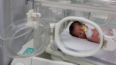 A Palestinian baby girl, saved from the womb of her mother Sabreen Al-Sheikh (Al-Sakani), who was killed in an Israeli strike along with her husband and her daughter (REUTERS)