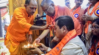 Union Minister and BJP leader Sarbananda Sonowal offers prayers at a Lord Hanuman temple on the occasion of 'Hanuman Jayanti', in Guwahati. (PTI)