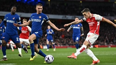 Arsenal's Leandro Trossard scores the first goal against Chelsea. (REUTERS)