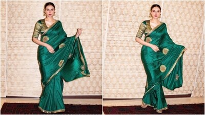 Aditi Rao Hydari posted pictures of herself dressed in the green silk saree on Instagram. The actor captioned her post, "Malli poo mornings." The six yards she wore is from the celebrity-favourite clothing label Raw Mango. The drape features purple thread embroidery, gold peacock embellishments done with thread and taar work, and an intricate golden patti design done on the borders. (Instagram) Aditi Rao Hydari posted pictures of herself dressed in the green silk saree on Instagram. The actor captioned her post, "Malli poo mornings." The six yards she wore is from the celebrity-favourite clothing label Raw Mango. The drape features purple thread embroidery, gold peacock embellishments done with thread and taar work, and an intricate golden patti design done on the borders. (Instagram)