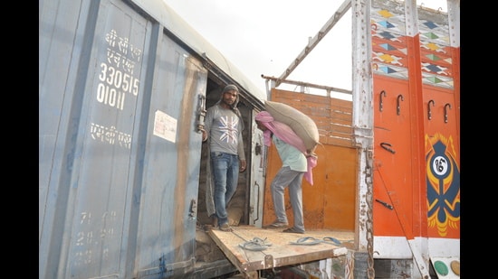 Punjab food and civil supplies department has expressed concerns that they were running out of storage space for freshly harvested wheat as process of transportation of grains to consumer states, has slowed down. (HT )