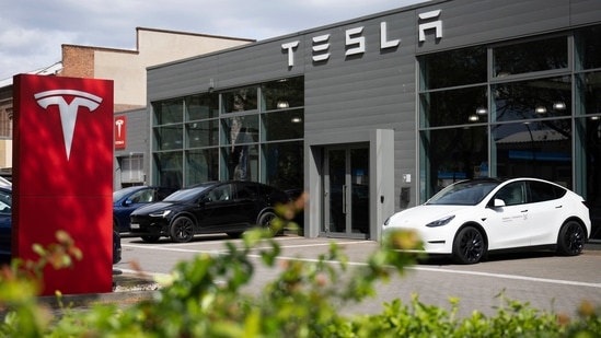 Cars are parked at a Tesla dealership in Berlin Tuesday, April 23, 2024. (Sebastian Christoph Gollnow/dpa via AP) (AP)