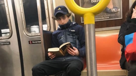 Timothee Chalamet clicked by a fan on the subway as he read Frank Herbert's Dune. A few years later, he went on to star in Denis Villeneuve's adaptation of the epic sci-fi novel.