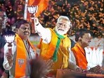Prime Minister Narendra Modi holds a roadshow with Madhya Pradesh Chief Minister Mohan Yadav in support of the Bharatiya Janata Party (BJP) candidate from Bhopal seat Alok Sharma for the second phase of the Lok Sabha elections, in Bhopal on Wednesday. (ANI)