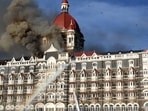26/11 - Mumbai Under Terror Attack - Firing - Fire at Taj Hotel - Fire brigade officers fighting with fire at Taj hotel - HT photo by Hemant Padalkar. 27.11.08