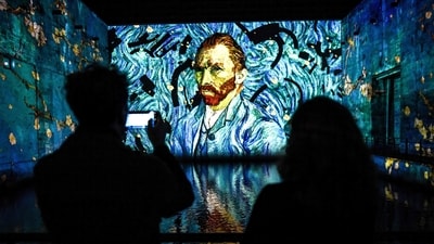 The Real Van Gogh Immersive Experience showcases the Dutch master's art in a 30-minute show, aiming to deepen people's understanding and appreciation of Van Gogh's work. (Photo by Christophe ARCHAMBAULT / AFP) The Real Van Gogh Immersive Experience showcases the Dutch master's art in a 30-minute show, aiming to deepen people's understanding and appreciation of Van Gogh's work. (Photo by Christophe ARCHAMBAULT / AFP)