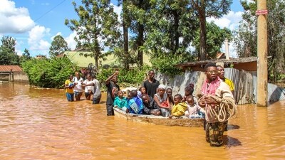 A family uses a boat after fleeing floodwaters that wreaked havoc in the Githurai area of Nairobi, Kenya, Wednesday, April 24, 2024. (AP) A family uses a boat after fleeing floodwaters that wreaked havoc in the Githurai area of Nairobi, Kenya, Wednesday, April 24, 2024. (AP)