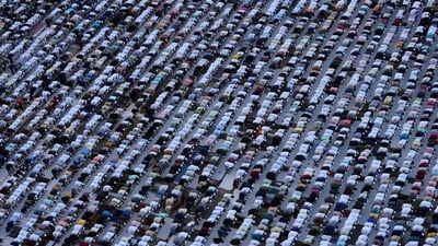 Muslims offer Eid al-Fitr prayer in Mumbai on April 11. (AP) Muslims offer Eid al-Fitr prayer in Mumbai on April 11. (AP)