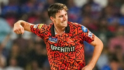 Sunrisers Hyderabad bowler Pat Cummins celebrates the wicket of Royal Challengers Bengaluru batter Faf du Plessis (PTI) Sunrisers Hyderabad bowler Pat Cummins celebrates the wicket of Royal Challengers Bengaluru batter Faf du Plessis (PTI)