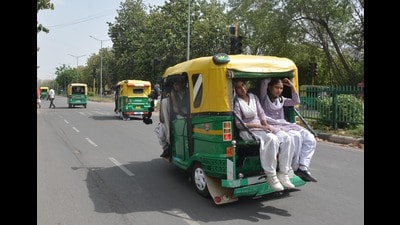 Schoolchildren returning home in crowded auto-rickshaws, which are not allowed to carry over four kids as per high court guidelines. (Ravi Kumar/HT) Schoolchildren returning home in crowded auto-rickshaws, which are not allowed to carry over four kids as per high court guidelines. (Ravi Kumar/HT)