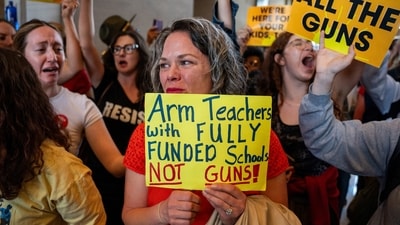 Allison Polidor reacts after the House voted to adopt Senate Bill 1325 at the Tennessee State Capitol building, a bill that will authorize teachers, principals, and school personnel to carry a concealed handgun on school grounds, in Nashville, Tennessee, U.S., April 23, 2024. REUTERS/Seth Herald (REUTERS)
