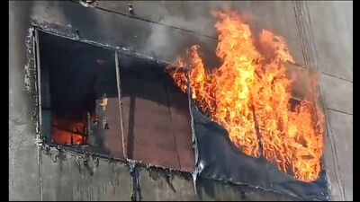 The building on fire . (HT) The building on fire . (HT)