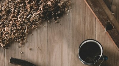 Distressing: Use sandpaper or distressing tools to create worn edges and faded spots, evoking a weathered, vintage appearance. (Unsplash)