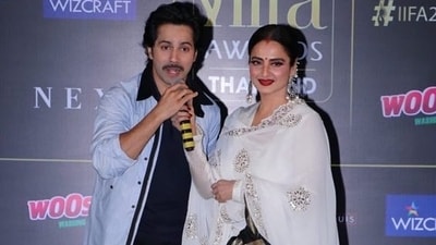 Over the years, Varun Dhawan, has often taken to Instagram to share photos of himself posing with other celebs. Like this 2018 picture he posted with veteran actor Rekha. He wrote in his caption, "IIFA 2018 is gonna be lit. We promise to put on a good show. I got the chance to speak to Rekha ji last night, and she is very passionate about her performance." 