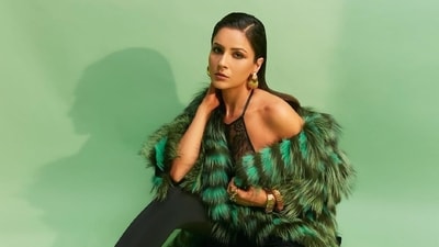 Shehnaaz Gill took to Instagram to share pictures from a new sizzling photoshoot and delighted her fans with a sensuous avatar. The photos show Shehnaaz in a black lacy embroidered bralette, pantashoes and a faux fur coat. The actor captioned the post, "Intensity is the game; allure is the name." Scroll through to see her photoshoot. (Instagram) Shehnaaz Gill took to Instagram to share pictures from a new sizzling photoshoot and delighted her fans with a sensuous avatar. The photos show Shehnaaz in a black lacy embroidered bralette, pantashoes and a faux fur coat. The actor captioned the post, "Intensity is the game; allure is the name." Scroll through to see her photoshoot. (Instagram)