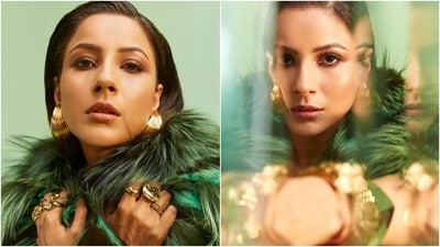 Meanwhile, Shehnaaz's jacket features fur in dark and light green shades. It also has an open front, full-length sleeves, and an oversized silhouette. Shehnaaz draped the faux fur blazer on her shoulders to complete the look. (Instagram) Meanwhile, Shehnaaz's jacket features fur in dark and light green shades. It also has an open front, full-length sleeves, and an oversized silhouette. Shehnaaz draped the faux fur blazer on her shoulders to complete the look. (Instagram)