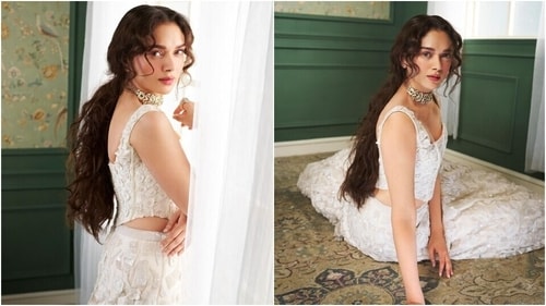 Aditi Rao Hydari poses in a white floral lehenga set for a Heeramandi promotional photoshoot. (Instagram)