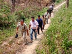 Polling officials leave for election duty on the eve of the 2nd phase of Lok Sabha polls in Tripura.