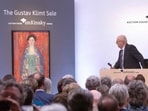 Auctioneer Michael Kovacek sells the Gustav Klimt painting "Portrait of Miss Lieser" for 30,000,000 Euros during the auction in Vienna.