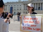 A TikTok content creator, speaks to reporters outside the U.S. Capitol, Tuesday, April 23, 2024, in Washington, as Senators prepare to consider legislation that would force TikTok's China-based parent company to sell the social media platform under the threat of a ban, a contentious move by U.S. lawmakers. (AP Photo/Mariam Zuhaib)