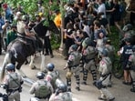 Pro-Palestinian protesters are pushed to the edge of campus by Texas State Troopers on horses at the University of Texas Wednesday, April 24, 2024, in Austin, Texas. Pro-Palestinian protesters are pushed to the edge of campus by Texas State Troopers on horses at the University of Texas Wednesday, April 24, 2024, in Austin, Texas.