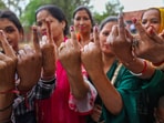 Women Voter show their ink marked fingers after casting votes at a polling station during the first phase of Lok Sabha polls.(PTI)