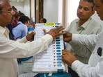 Polling officials during a training programme on the functioning of Electronic Voting Machine (EVM) (PTI)