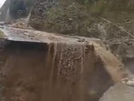 A video that surfaced online showed a wide and deep cut in the road with a continuous flow of rainwater.