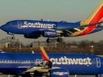 Southwest Airlines is set to suspend service at four airports across the US (AP Photo/Kiichiro Sato, File)