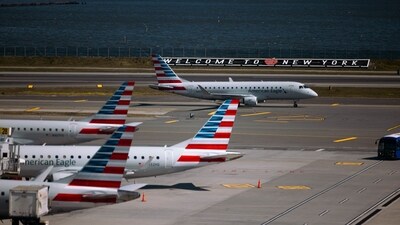American Airlines planes at Terminal B of LaGuardia Airport (LGA) in the Queens borough of New York, US, on Sunday, April 7, 2024. American Airlines Group Inc. is expected to release earnings figures on April 25. Photographer: Angus Mordant/Bloomberg (Bloomberg) American Airlines planes at Terminal B of LaGuardia Airport (LGA) in the Queens borough of New York, US, on Sunday, April 7, 2024. American Airlines Group Inc. is expected to release earnings figures on April 25. Photographer: Angus Mordant/Bloomberg (Bloomberg)