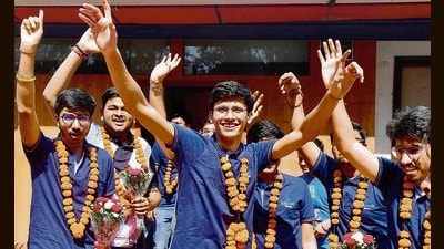 Agrim Bhanot (centre), who secured AIR 81, celebrates with other students after the results of JEE Main exam were declared, in Ludhiana on Thursday. (Manish/HT) Agrim Bhanot (centre), who secured AIR 81, celebrates with other students after the results of JEE Main exam were declared, in Ludhiana on Thursday. (Manish/HT)