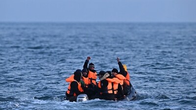 (FILES) Migrants travel in an inflatable boat across the English Channel, bound for Dover on the south coast of England. UK Prime Minister Rishi Sunak on April 22, 2024, promised to begin deporting asylum seekers to Rwanda in coming months as part of a plan to deter arrivals that has sparked controversy. "We are ready, plans are in place and these flights will go, come what may," Sunak told a Downing Street news conference, hours before parliament is set to approve a key part of the proposal. (Photo by Ben Stansall / AFP) (AFP) (FILES) Migrants travel in an inflatable boat across the English Channel, bound for Dover on the south coast of England. UK Prime Minister Rishi Sunak on April 22, 2024, promised to begin deporting asylum seekers to Rwanda in coming months as part of a plan to deter arrivals that has sparked controversy. "We are ready, plans are in place and these flights will go, come what may," Sunak told a Downing Street news conference, hours before parliament is set to approve a key part of the proposal. (Photo by Ben Stansall / AFP) (AFP)