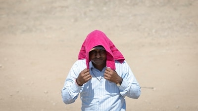 Lakhs of voters will have to bear the searing heat when they step out to exercise their franchise in the second phase of the Lok Sabha elections on Friday. (REUTERS)