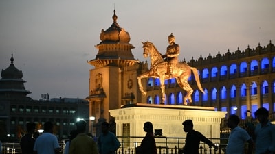 People visit Vidhana Soudha during sunset, in Bengaluru on April 21, 2024. (Photo by Idrees MOHAMMED / AFP) (AFP) People visit Vidhana Soudha during sunset, in Bengaluru on April 21, 2024. (Photo by Idrees MOHAMMED / AFP) (AFP)