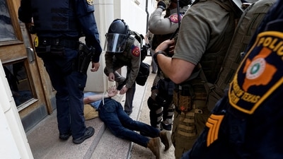 A man is detained as pro-Palestinian protesters demonstrate at the University of Texas, during the ongoing conflict between Israel and the Palestinian Islamist group Hamas, in Austin, Texas, U.S. April 24, 2024.    REUTERS/Nuri VallbonaTexas (REUTERS)