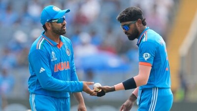 India's Hardik Pandya, right, hands the ball to captain Rohit Sharma during the ICC Men's Cricket World Cup last year. (AP) India's Hardik Pandya, right, hands the ball to captain Rohit Sharma during the ICC Men's Cricket World Cup last year. (AP)