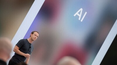 Meta CEO Mark Zuckerberg delivers a speech, as the letters AI for artificial intelligence appear on screen. (Reuters)