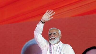 Prime Minister Narendra Modi waves to supporters at a rally in Aonla in Bareilly district on Thursday. (ANI PHOTO) Prime Minister Narendra Modi waves to supporters at a rally in Aonla in Bareilly district on Thursday. (ANI PHOTO)