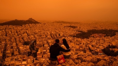 Athens and other Greek cities were covered in clouds of dust blown in from the Sahara desert, marking one of the worst such episodes to hit the country since 2018, officials said. (AFP) Athens and other Greek cities were covered in clouds of dust blown in from the Sahara desert, marking one of the worst such episodes to hit the country since 2018, officials said. (AFP)