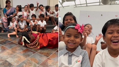 The image shows a teacher lying on the ground at a Tamil Nadu Montessori to record a video of her students. (Instagram/@salem_mehendhi_studio) The image shows a teacher lying on the ground at a Tamil Nadu Montessori to record a video of her students. (Instagram/@salem_mehendhi_studio)