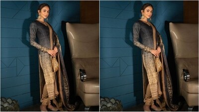 On Thursday, Rakul took to Instagram and uploaded a series of stunning pictures accompanied by the caption 'Aankon ki gustakhi'. In the post, she can be seen posing elegantly in a traditional black printed suit, looking like an ethereal, classy beauty. (Instagram/@rakulpreet) On Thursday, Rakul took to Instagram and uploaded a series of stunning pictures accompanied by the caption 'Aankon ki gustakhi'. In the post, she can be seen posing elegantly in a traditional black printed suit, looking like an ethereal, classy beauty. (Instagram/@rakulpreet)