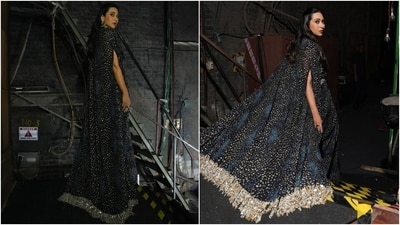 Karisma layered the saree with a matching drape jacket featuring an open front, a flowy silhouette, slits on the sides for arms, sequin embellishments, a&nbsp;rosette&nbsp;print, a floor-length hem, and golden tassels adorned on the borders. Lastly, a silver embellished belt cinched the saree on the waist to complete the look.&nbsp; (Instagram)