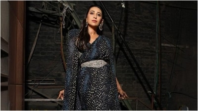 Karisma accessorised the ensemble with minimal jewels, including jhumkis, a ring, and high heels. Meanwhile, for the glam picks, Karisma chose silver eye shadow, winged eyeliner, mascara on the lashes, on-fleek darkened brows, rouge on the cheekbones, beaming highlighter, and smudged pink lip shade. Centre-parted wavy locks styled in a half-up, half-down hairdo completed the look.&nbsp; (Instagram)