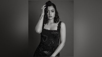 Meanwhile, for the glam picks, Rashmika opted for darkened brows, bronze eye shadow, black eyeliner, mascara on the lashes, smudged red lip shade, rouge on the cheeks, highlighter on the contours, and a dewy base. Side-parted loose locks styled in soft waves rounded it off. (Instagram) Meanwhile, for the glam picks, Rashmika opted for darkened brows, bronze eye shadow, black eyeliner, mascara on the lashes, smudged red lip shade, rouge on the cheeks, highlighter on the contours, and a dewy base. Side-parted loose locks styled in soft waves rounded it off. (Instagram)